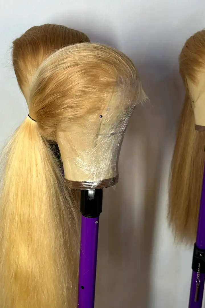 Finished blonde units resting on their stands